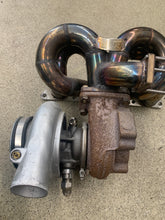 Load image into Gallery viewer, OBX racing exaust manifold and Holset HY35 turbo rebuilt by Justin whitesell.