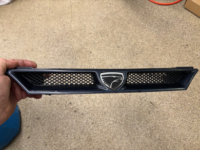 1990 Eagle Talon DSM  front grille midnight blue metallic.
