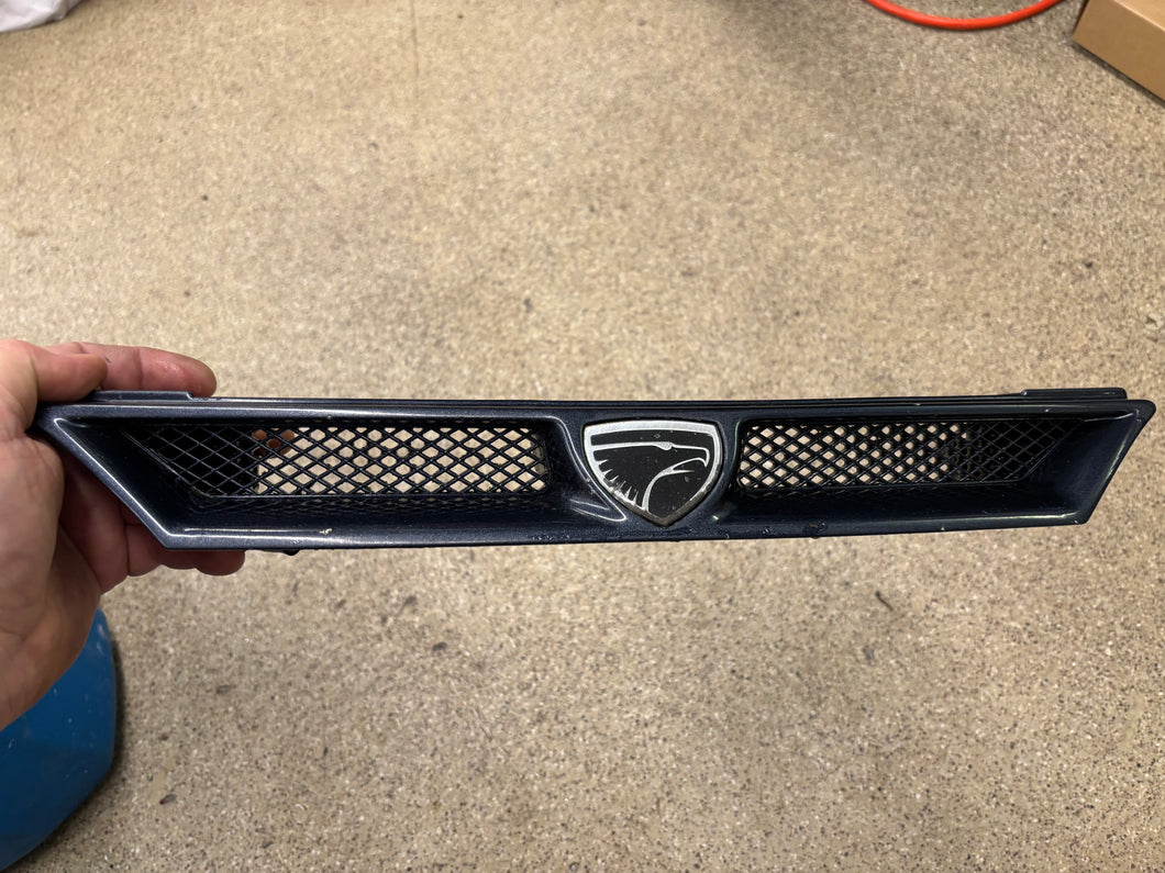 1990 Eagle Talon DSM  front grille midnight blue metallic.