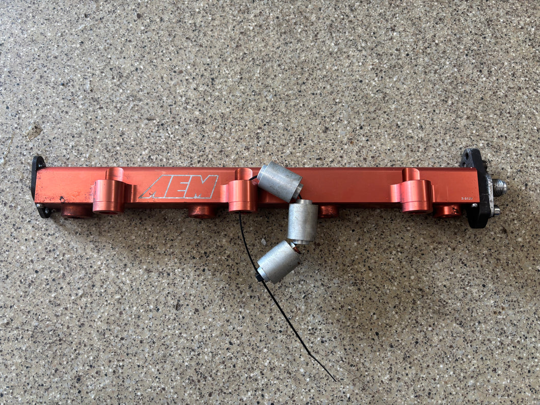 AEM fuel rail with spacers 4G63 DSM