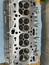 Load image into Gallery viewer, 1g OEM+ cylinder head evo sodium filled exhaust valves &amp; Evo beehive springs &amp; retainers.