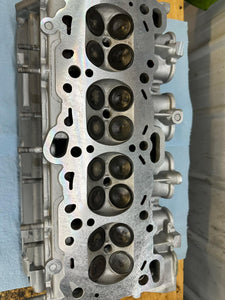 1g OEM+ cylinder head evo sodium filled exhaust valves & Evo beehive springs & retainers.
