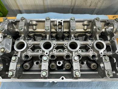 1g OEM+ cylinder head evo sodium filled exhaust valves & Evo beehive springs & retainers.