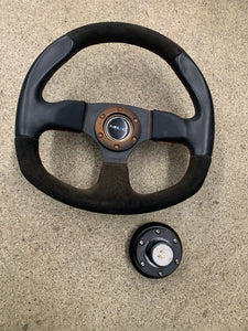 NGR innovation steering wheel with quick release off a 2G eclipse