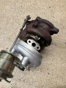 MHI Evo 3 16g turbo.