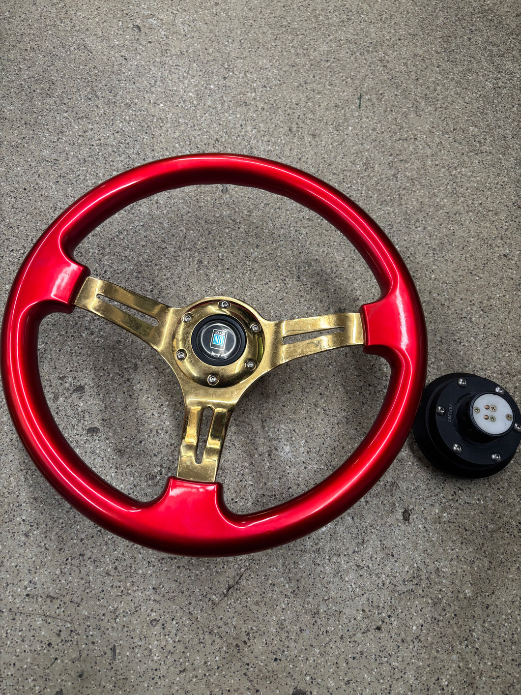 Candy Red Nardi 14 inch steering wheel with NRG quick release.