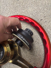 Load image into Gallery viewer, Candy Red Nardi 14 inch steering wheel with NRG quick release.