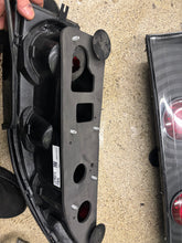 Load image into Gallery viewer, 2g 95-99 rear taillights and center piece G2 black assembly.
