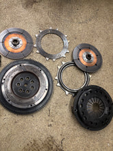 Load image into Gallery viewer, Competition Clutch twin disc we have both flywheels whichever you need 6 or 7 bolt AWD DSM