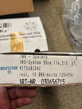Load image into Gallery viewer, H&amp;R Trak+ DRS-System wheel spacers for Mitsubishi. Part #030656715 New in boxes.