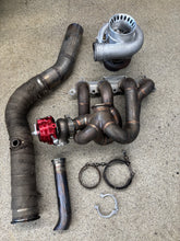 Load image into Gallery viewer, JMF Vband Top Mount manifold with PTE 6766 Journal bearing turbo in .82 ar housing and tial mvr 44mm wastegate and side exit exhaust and dump tube