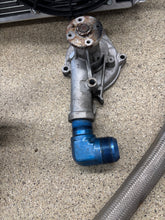 Load image into Gallery viewer, Chase bays tucked aluminum Radiator setup with the an lines.
