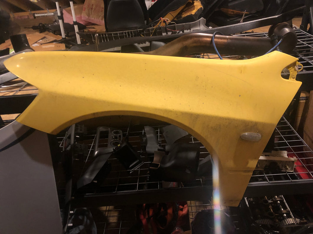 Yellow driver side fender
