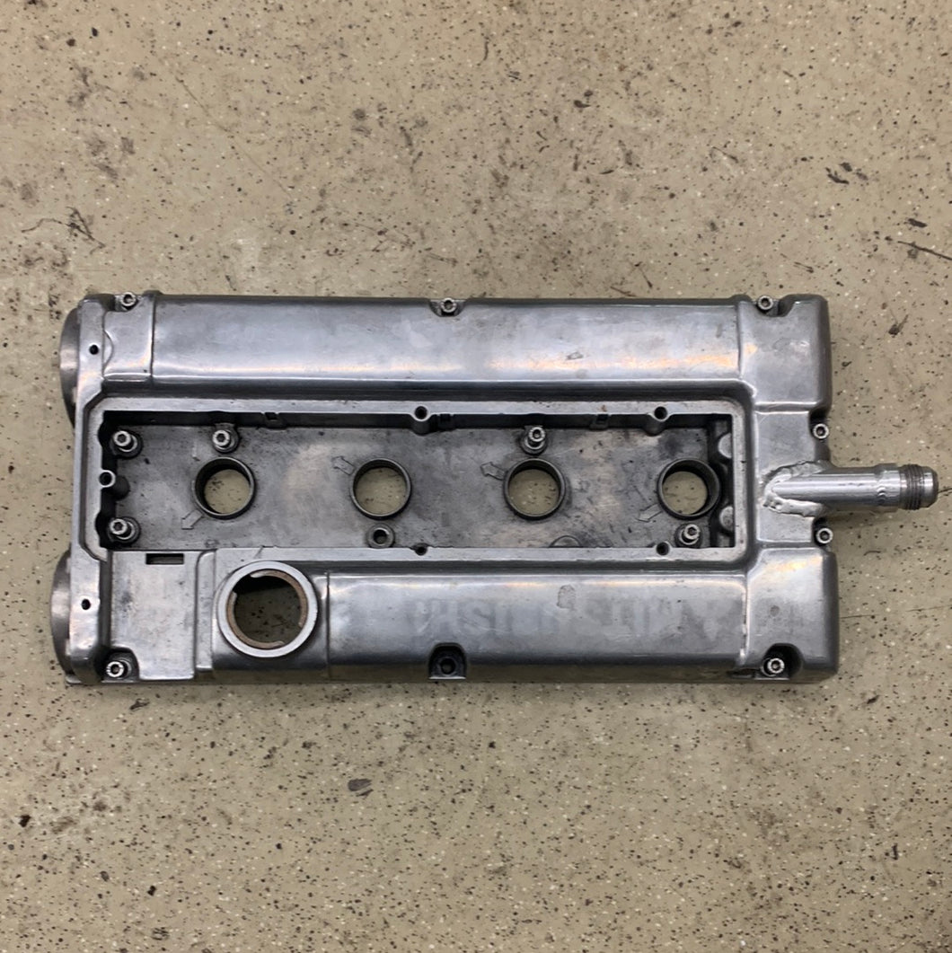 Polished valve cover with -12 weld in vent